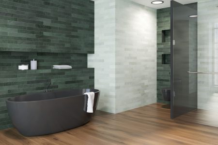 Luxury bathroom interior with emerald and white walls, a wooden floor, and a black bathtub. A side view. 3d rendering mock up